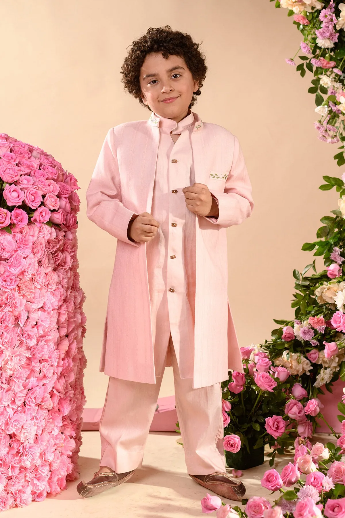 Farrokh- 

Embroidered Pink Achkan Paired With Matching Kurta  &  Trouser Set