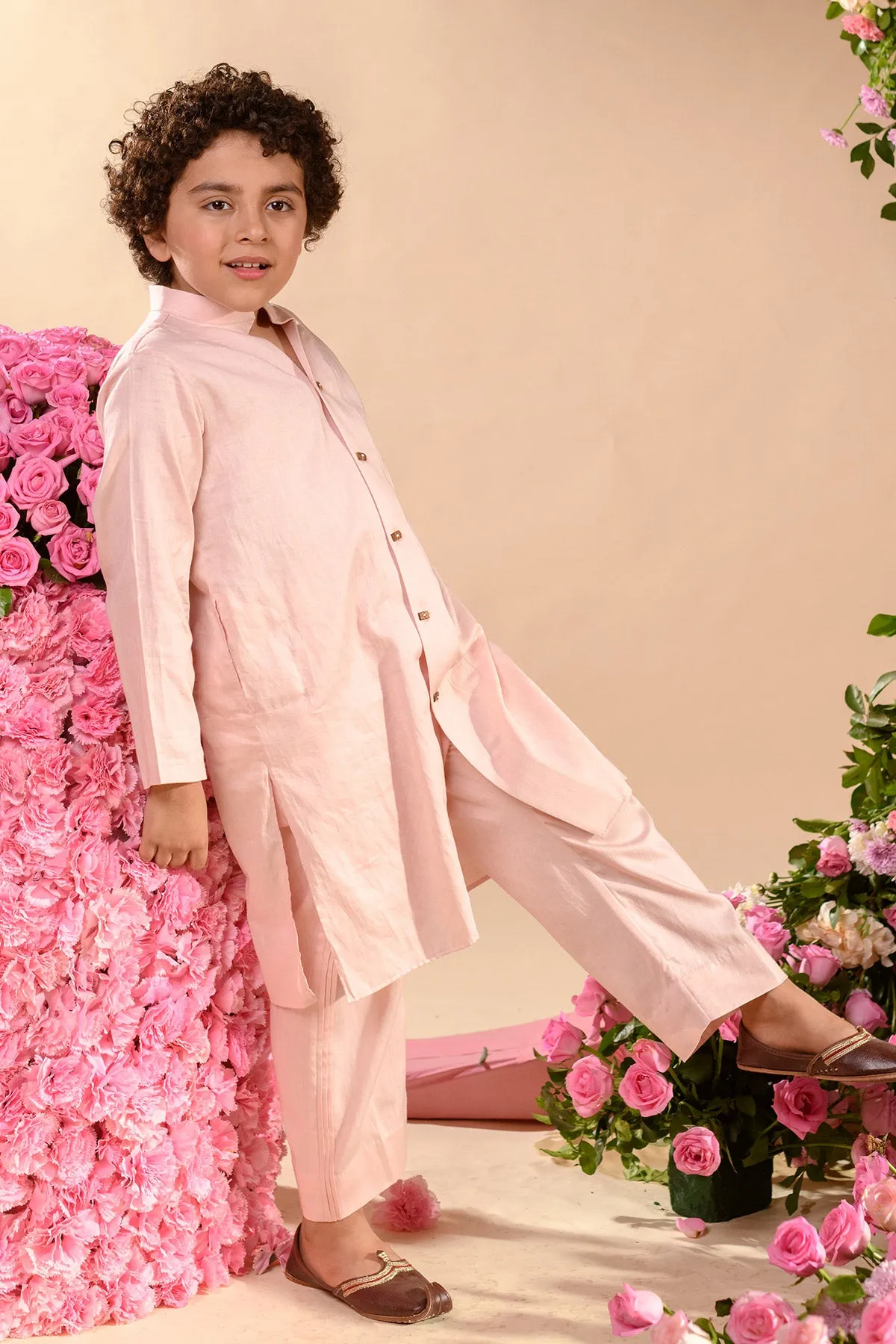 Farrokh- 

Embroidered Pink Achkan Paired With Matching Kurta  &  Trouser Set