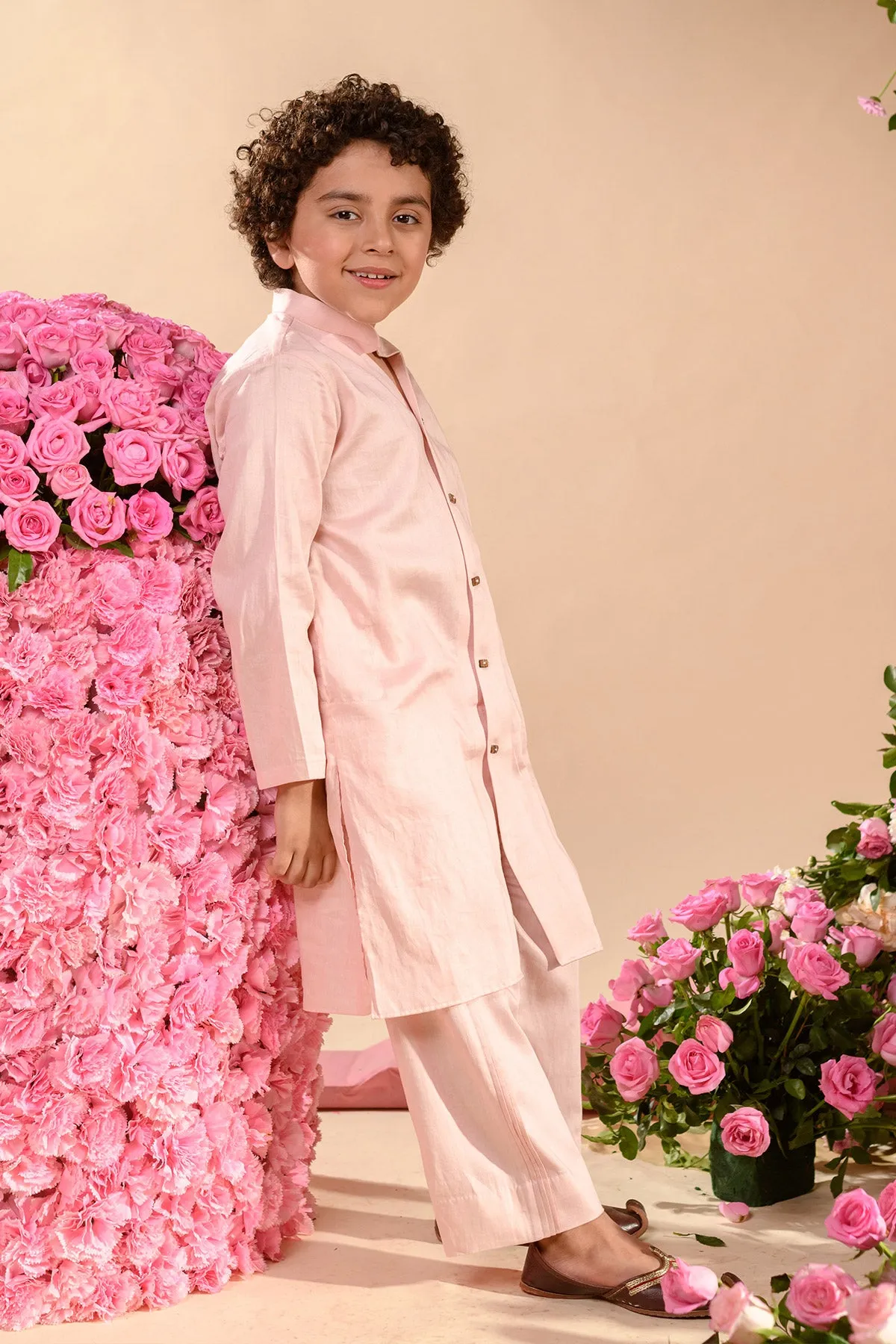 Farrokh- 

Embroidered Pink Achkan Paired With Matching Kurta  &  Trouser Set