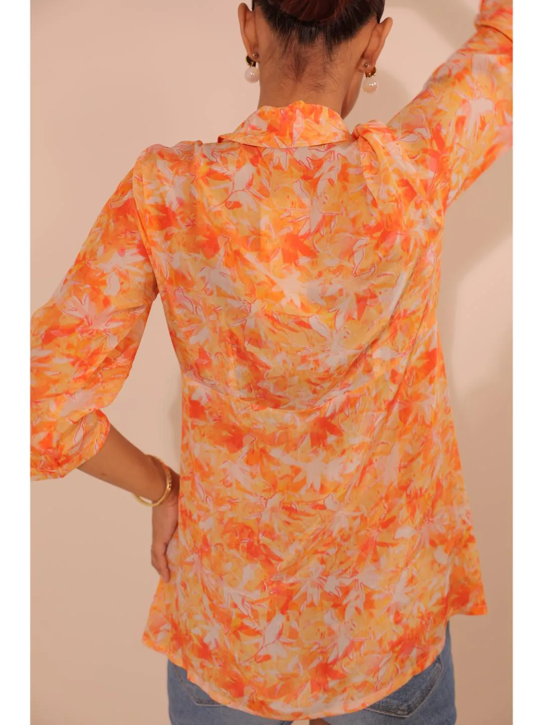 natural crepe abstract printed,  mandarin hand embellished collar stylised gathered busted top with three fourth sleeve. - Orange