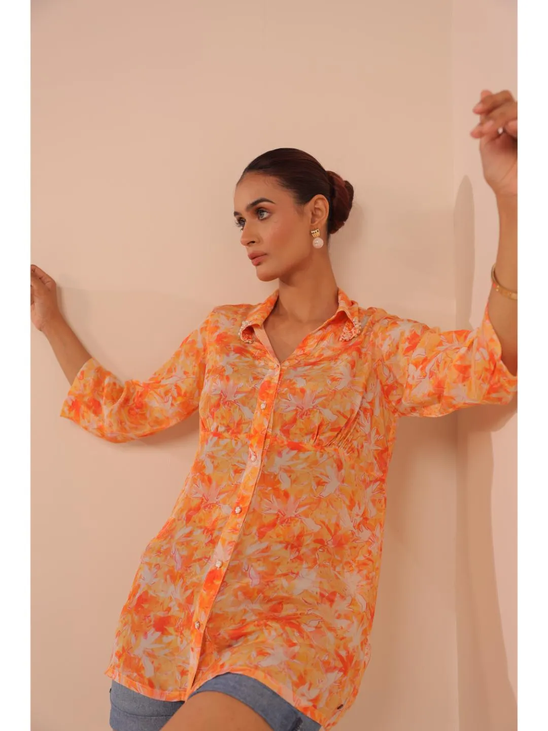 natural crepe abstract printed,  mandarin hand embellished collar stylised gathered busted top with three fourth sleeve. - Orange