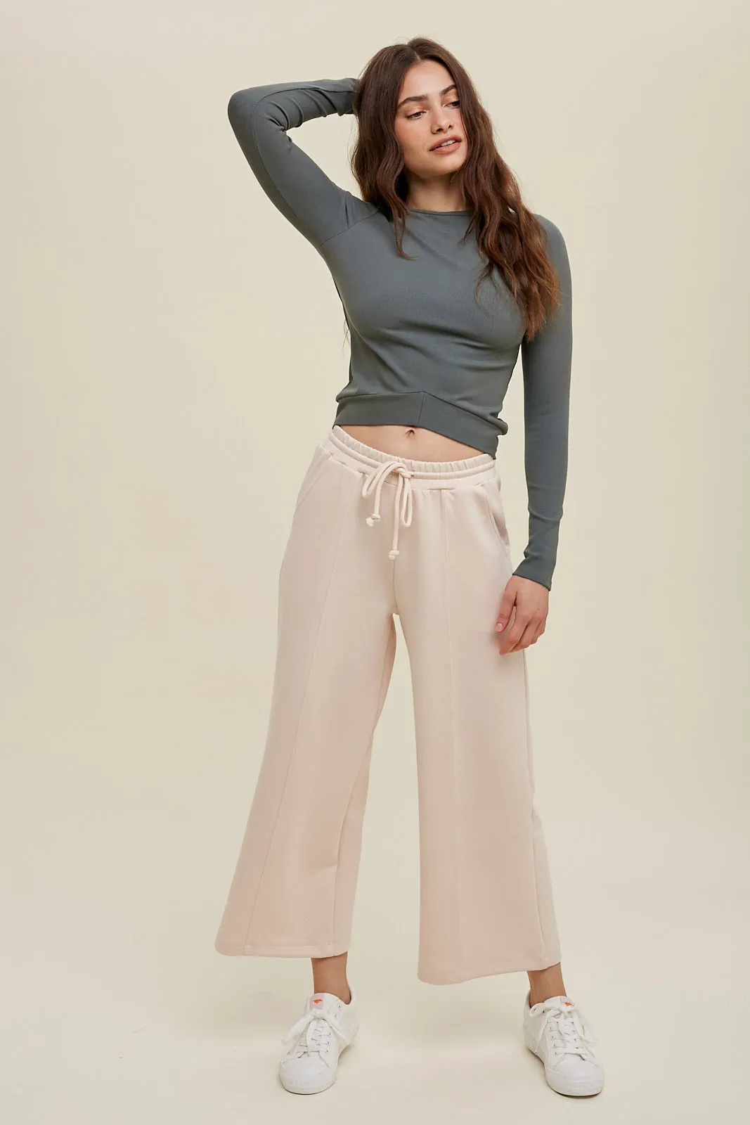 Scuba drawstring pants with side pockets and side slits